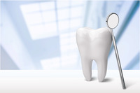 Zahnzusatz-Versicherung Zeigt ein Foto mit ein Zahn und einem Zahnspiegel